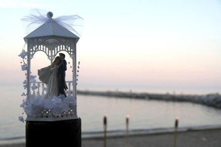 Wedding cake decoration with amazing sunset in the background