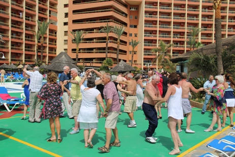 Jive dancing by the pool at Sunset Beach Club