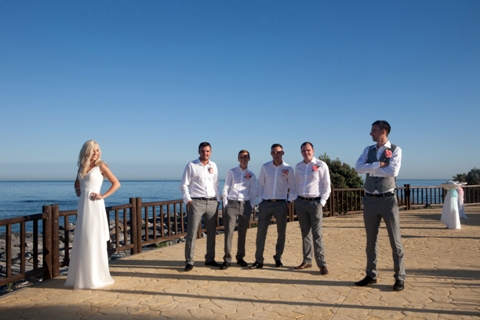 Bride and Groom on the sunny promenade