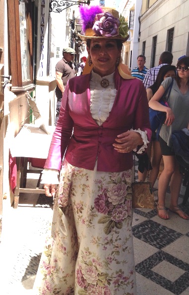 lady dressed in traditional costume for Ronda Romantica fair