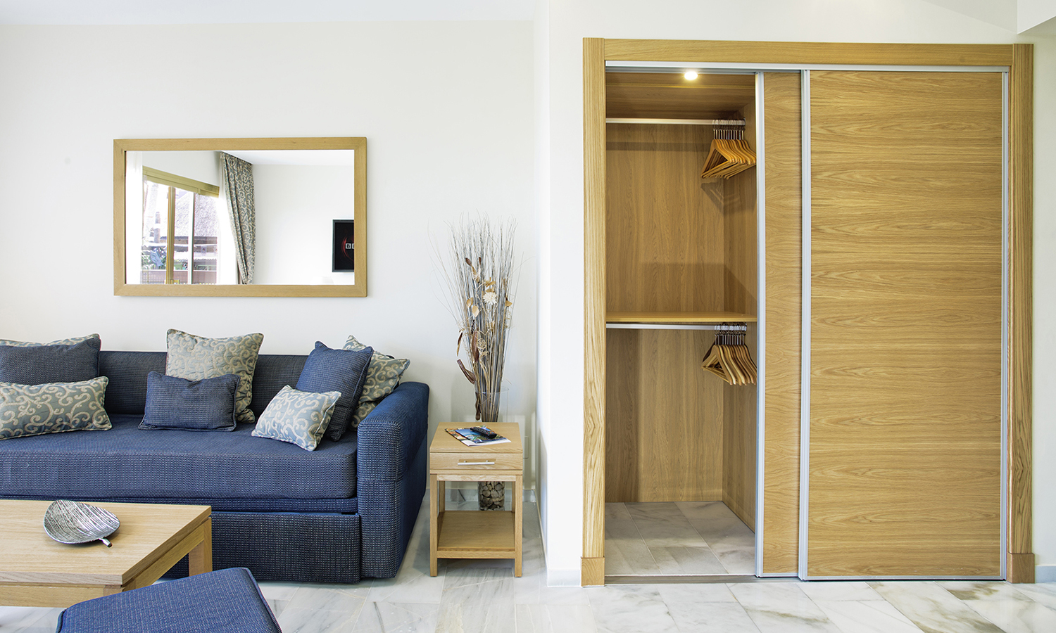 Wardrobe: Built-in wardrobe with sliding doors, and without skirting, so access is level with main floor